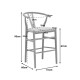 Σκαμπό μπαρ Wishbone pakoworld μεσαίου ύψους rubberwood-ύφασμα σε φυσική-γκρι απόχρωση 51x60x95εκ